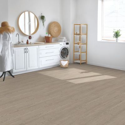 wood look laminate floors in a Ingersoll laundry room